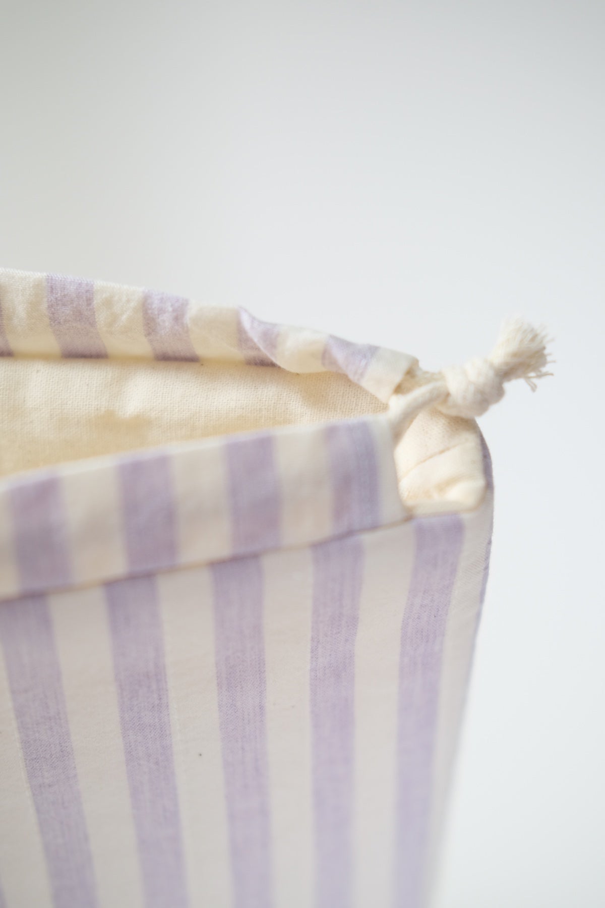 Lavender Milk Quilted Drawstring Bag - O Sleeves!